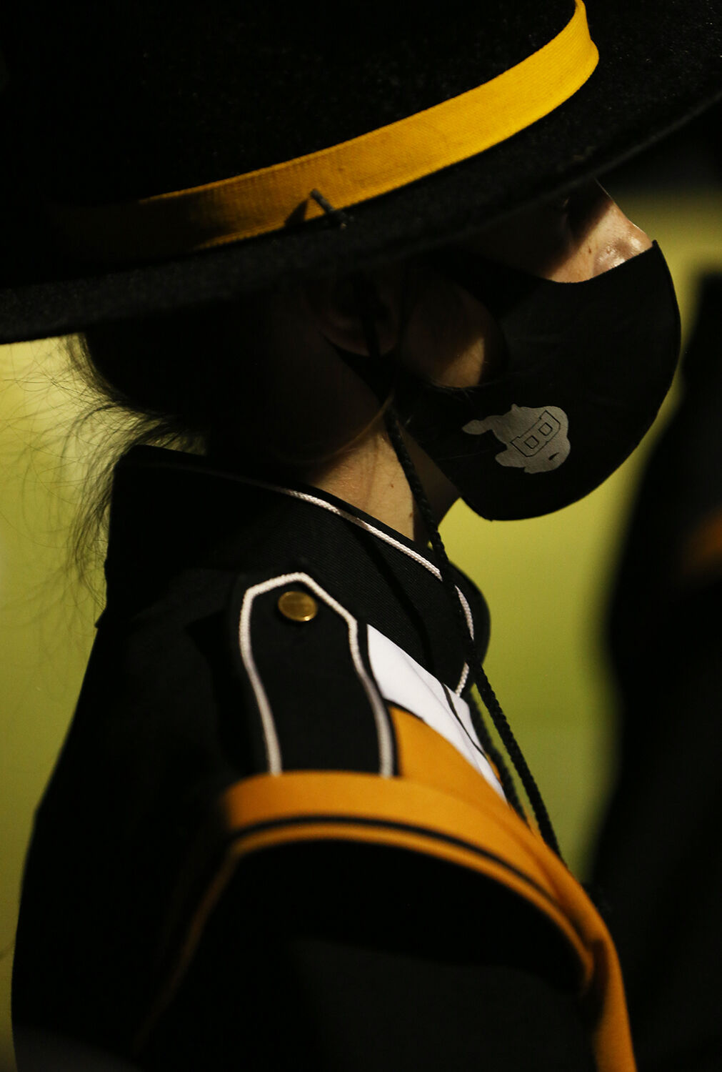 Band members are required to reapply their masks